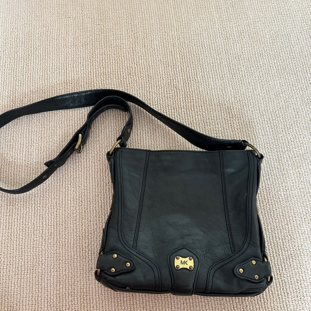 MICHAEL Michael Kors black leather hobo bag with crossbody strap and studs